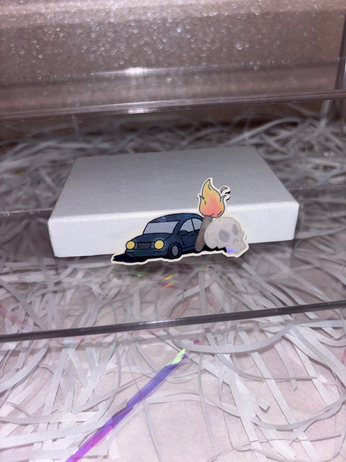 A Car, a Torch and a Death Sticker