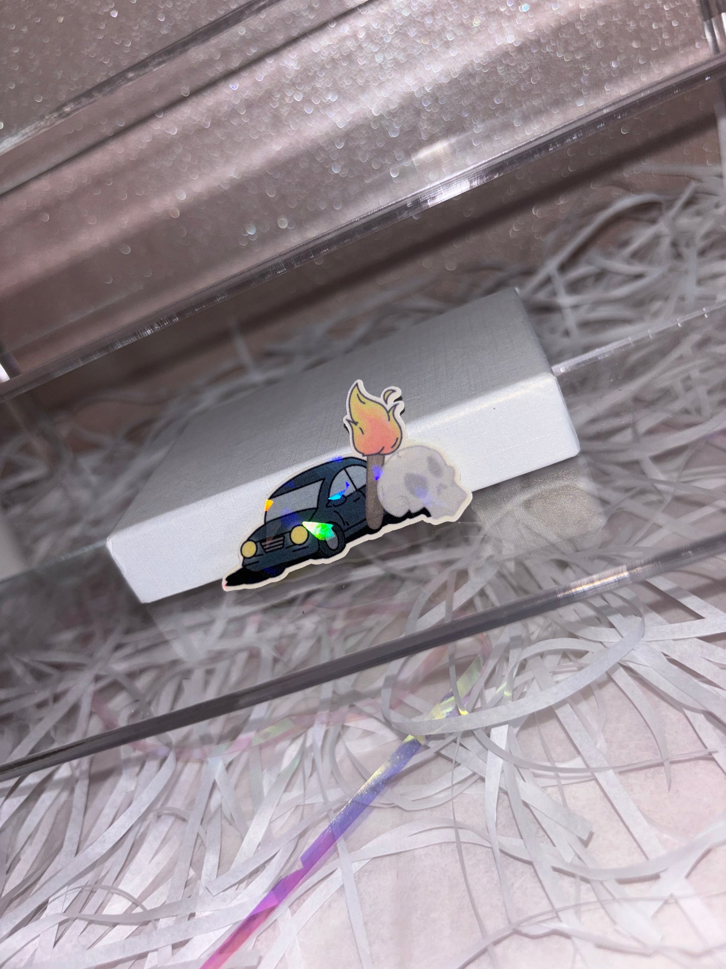 A Car, a Torch and a Death Sticker