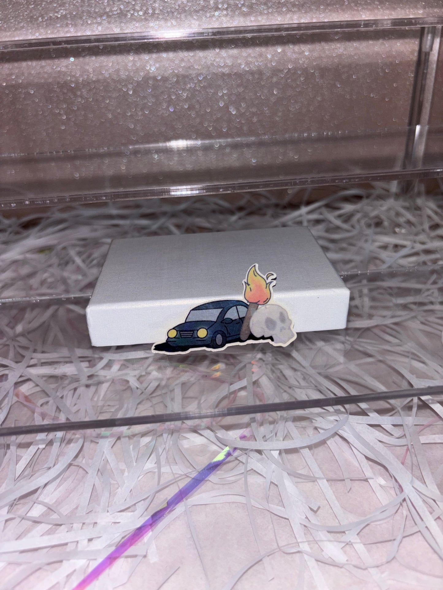 A Car, a Torch and a Death Sticker