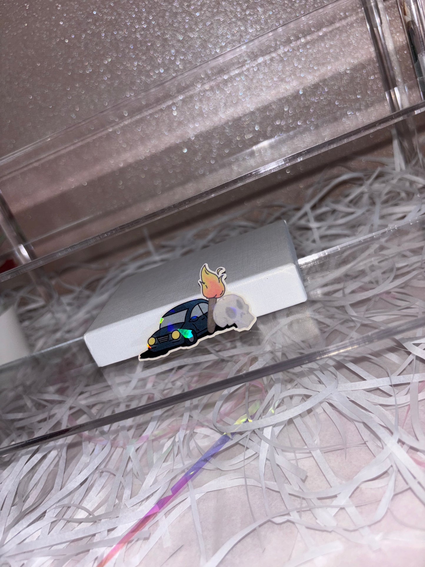 A Car, a Torch and a Death Sticker