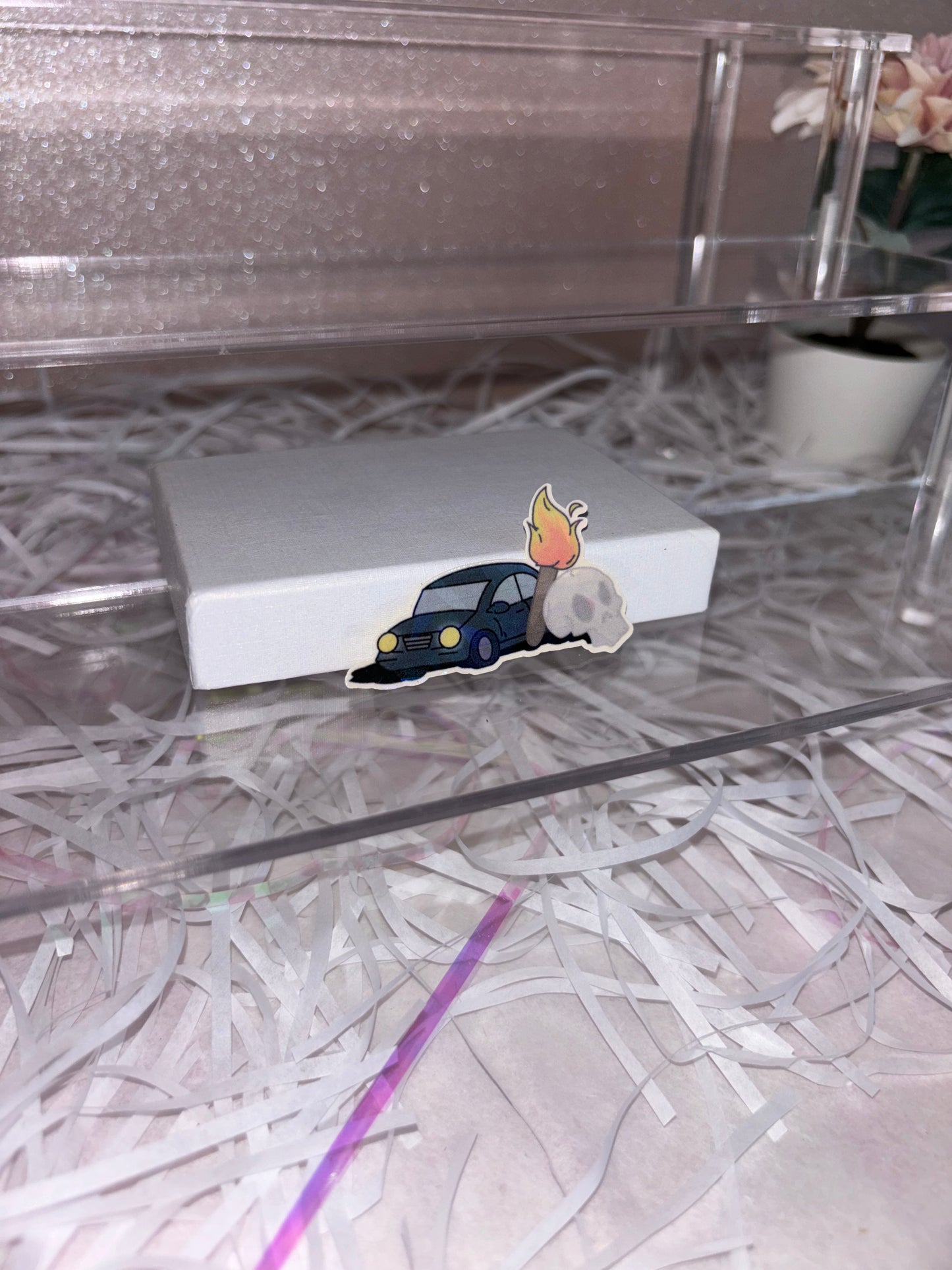 A Car, a Torch and a Death Sticker