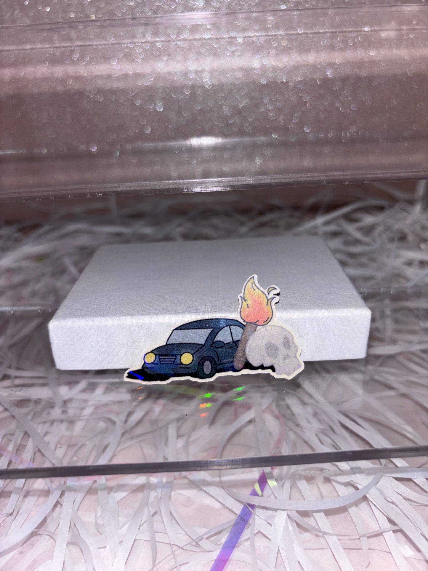 A Car, a Torch and a Death Sticker